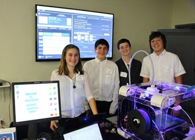 An image of McPherson Magnet students displaying a technology project