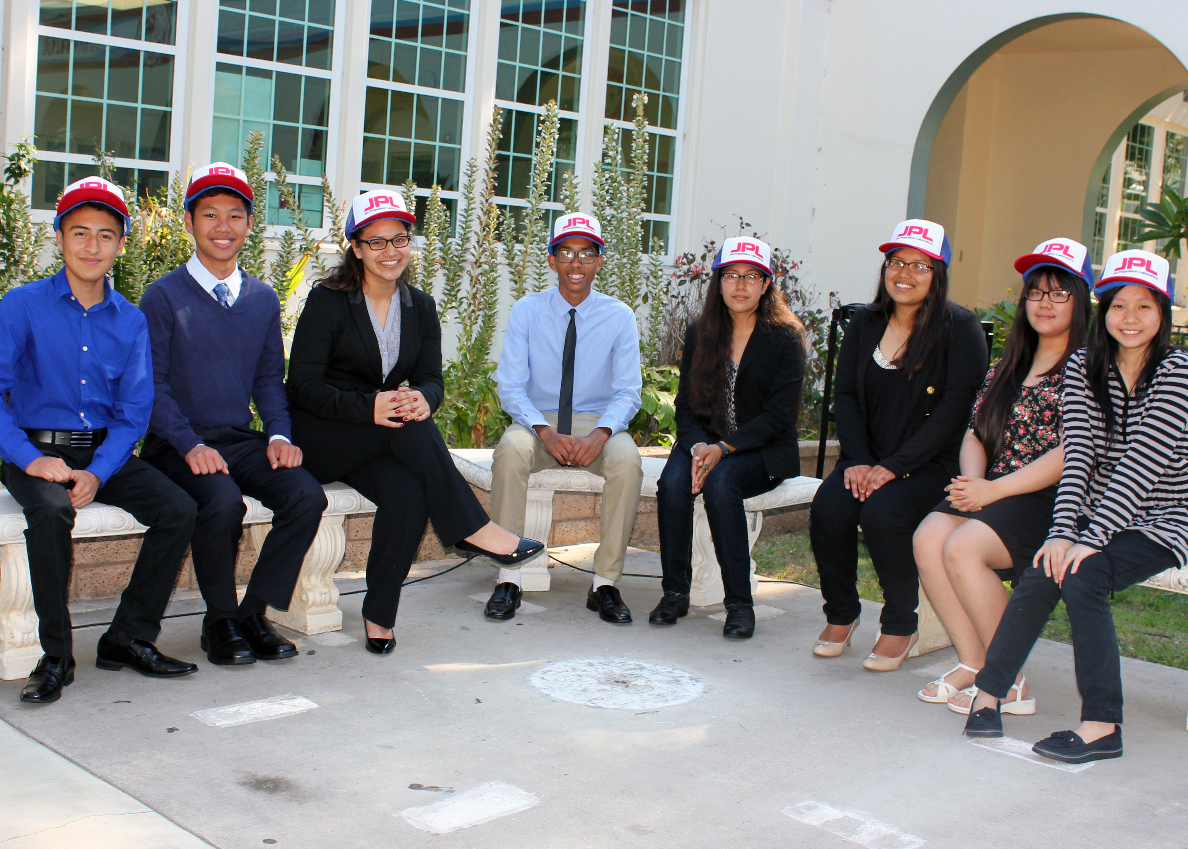 Santa Ana students wearing JPL hats