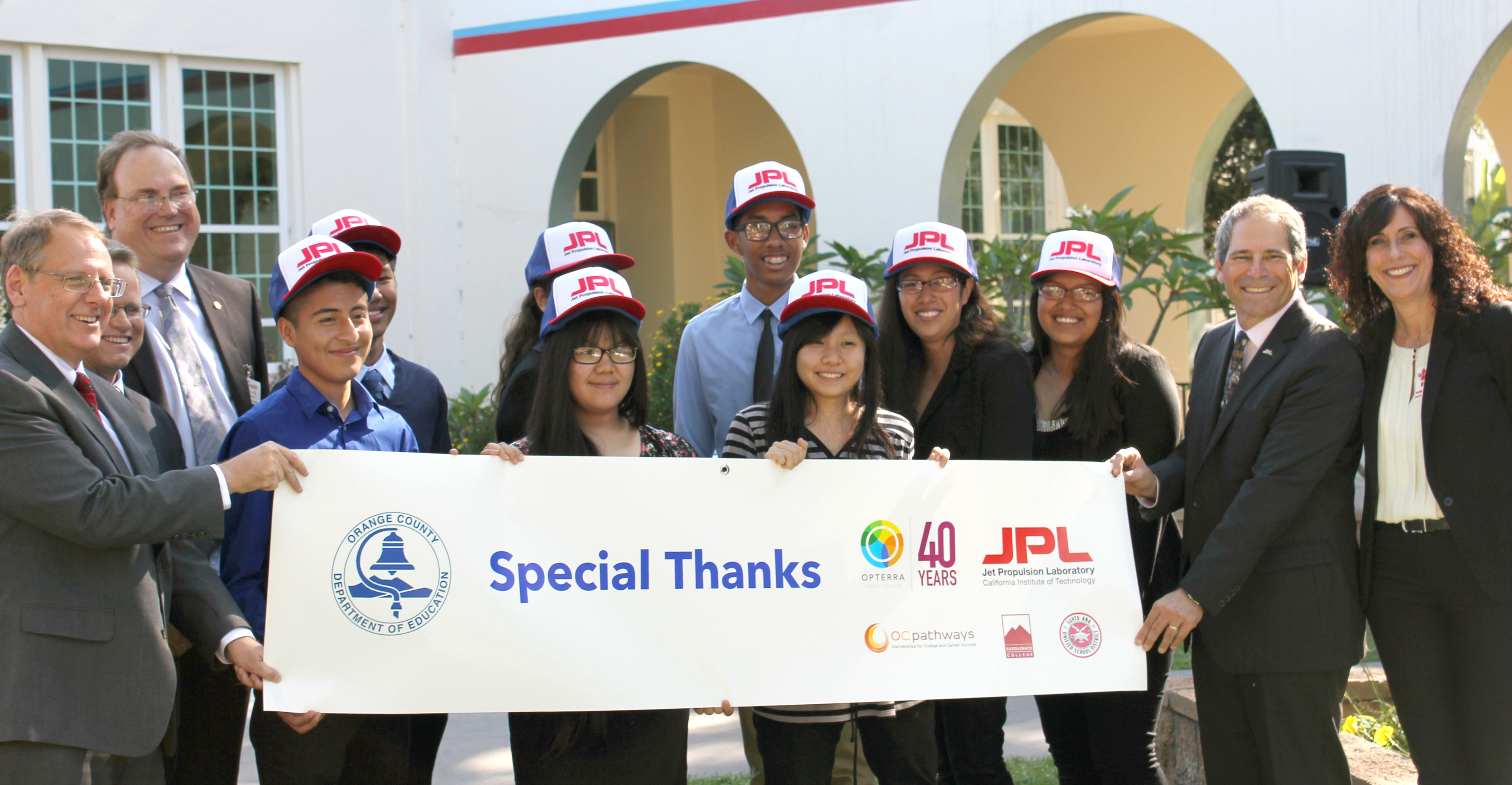 Santa Ana students wearing JPL hats