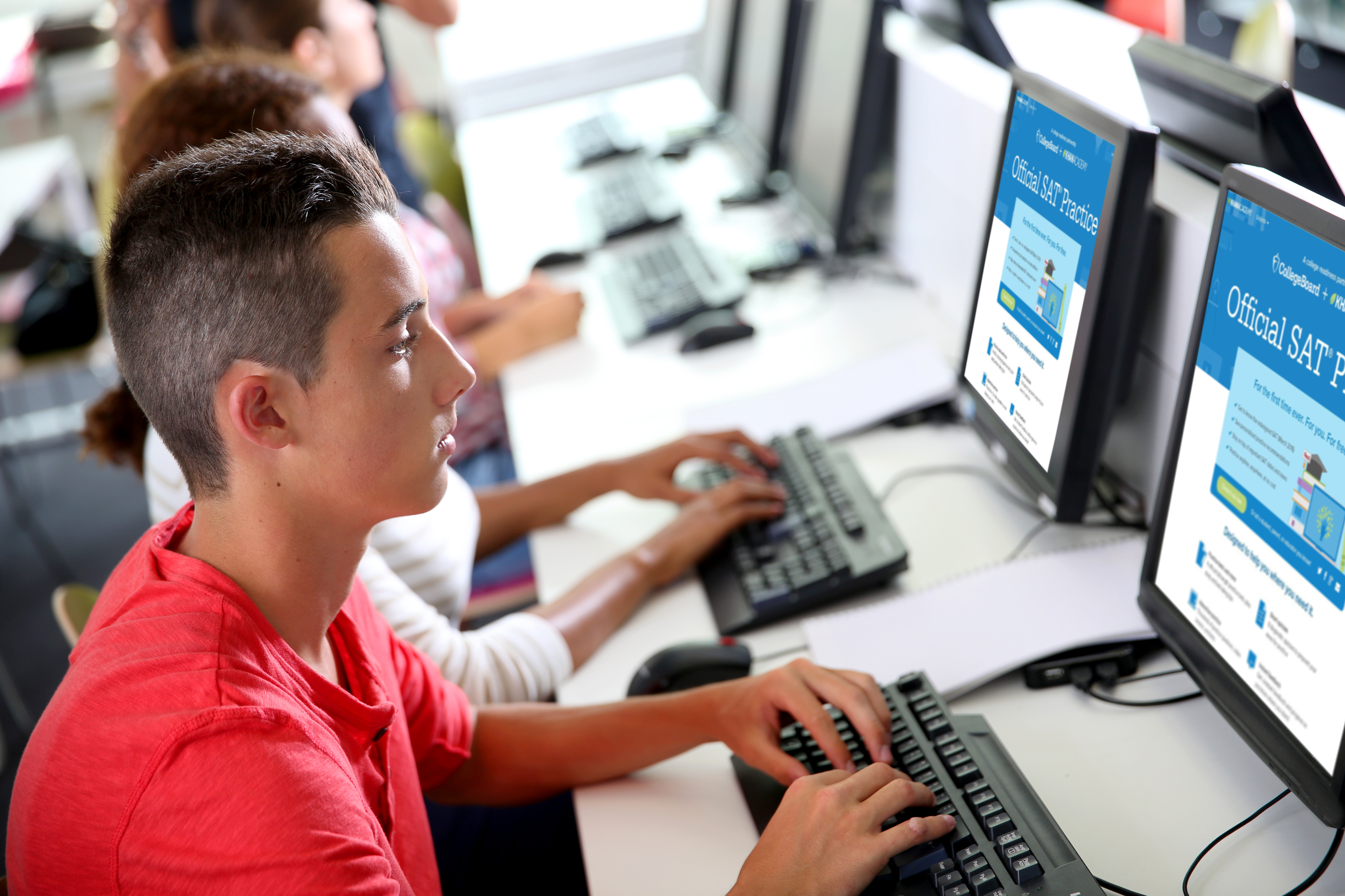 stock-photo-group-of-young-people-in-computing-class