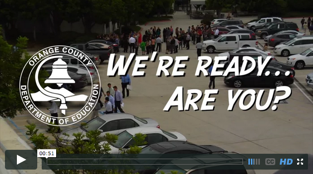 Screenshot from OCDE's earthquake drill video showing employees in the parking lot