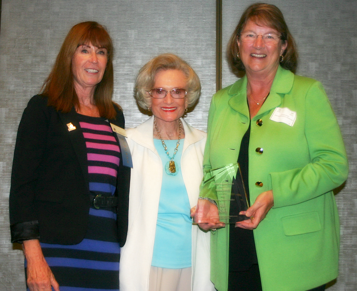 Susan Henry, president of the Huntington Beach Union High School District’s Board of Trustees, with an award