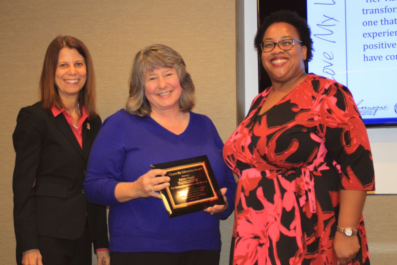 Sylvia Cieply receiving the 2015 I Love My Librarian Award