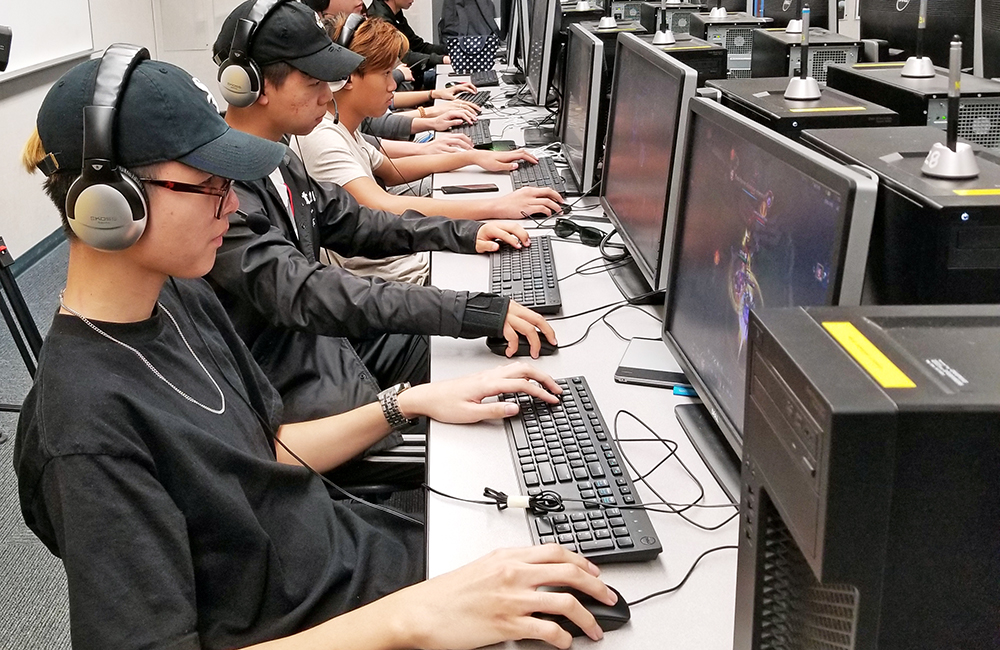 Students on computers participating in online gaming