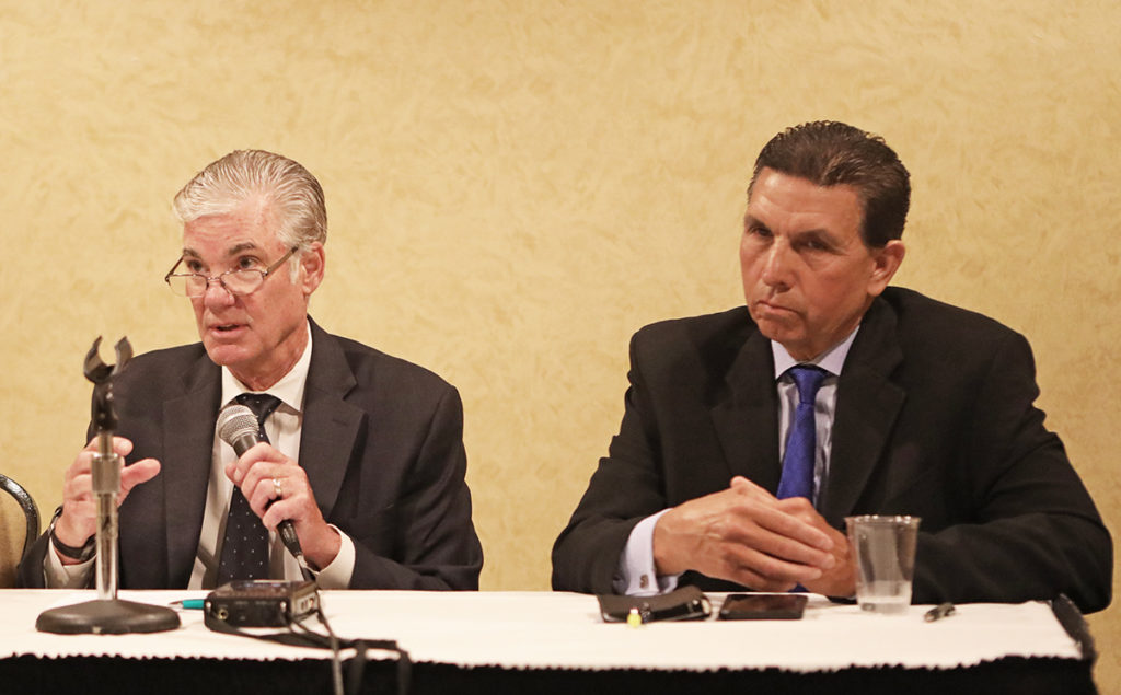 Tom Torlakson (left) and OC Superintendent Al Mijares discuss school safety issues during panel.