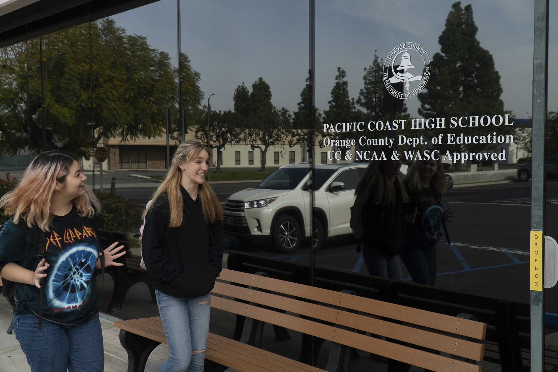 Students in front of Pacific Coast High School