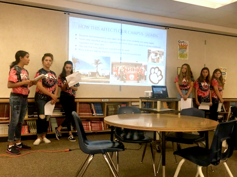 Students giving a PowerPoint presentation