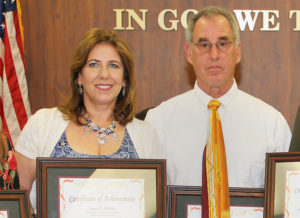 Karen Allison poses Norman Dobrofsky classified employees of the year