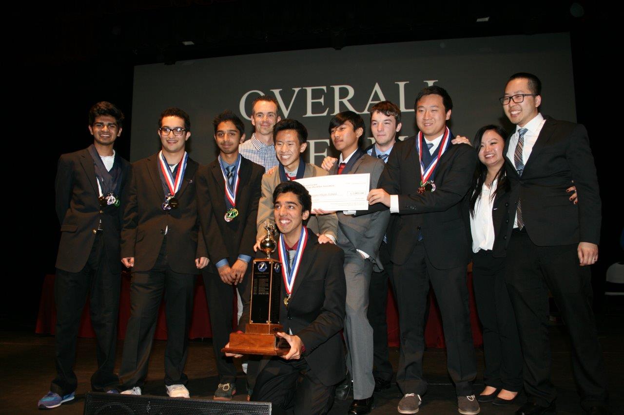 Students posing for a photo after winning the Orange County Academic Decathlon