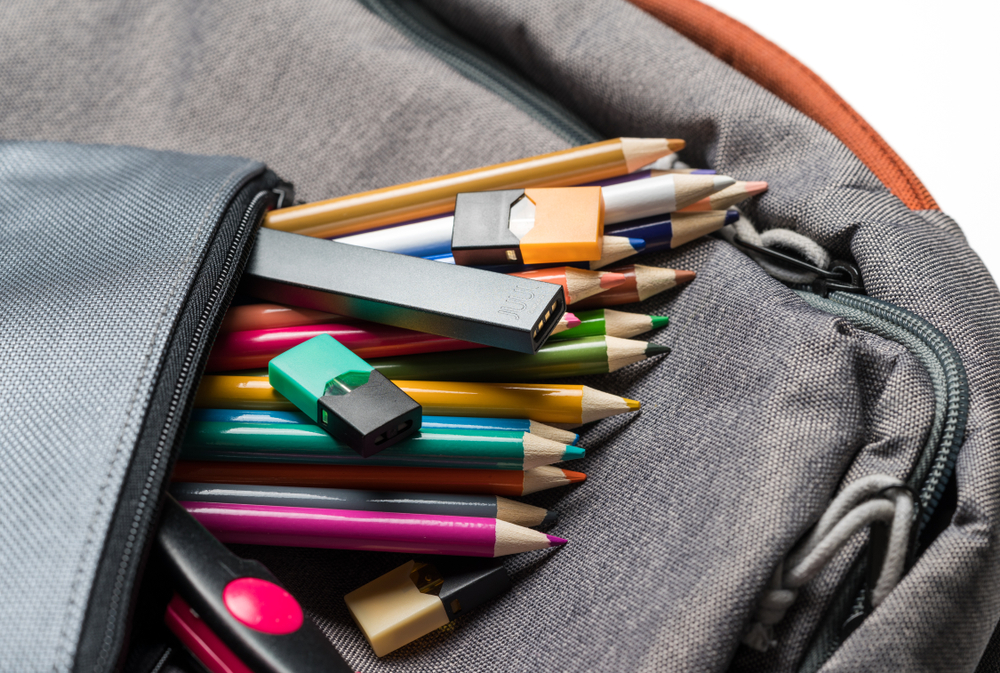 Backpack bag with pencils and vape stick