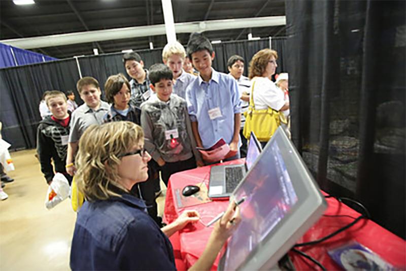 An image of students observing a STEM demonstration