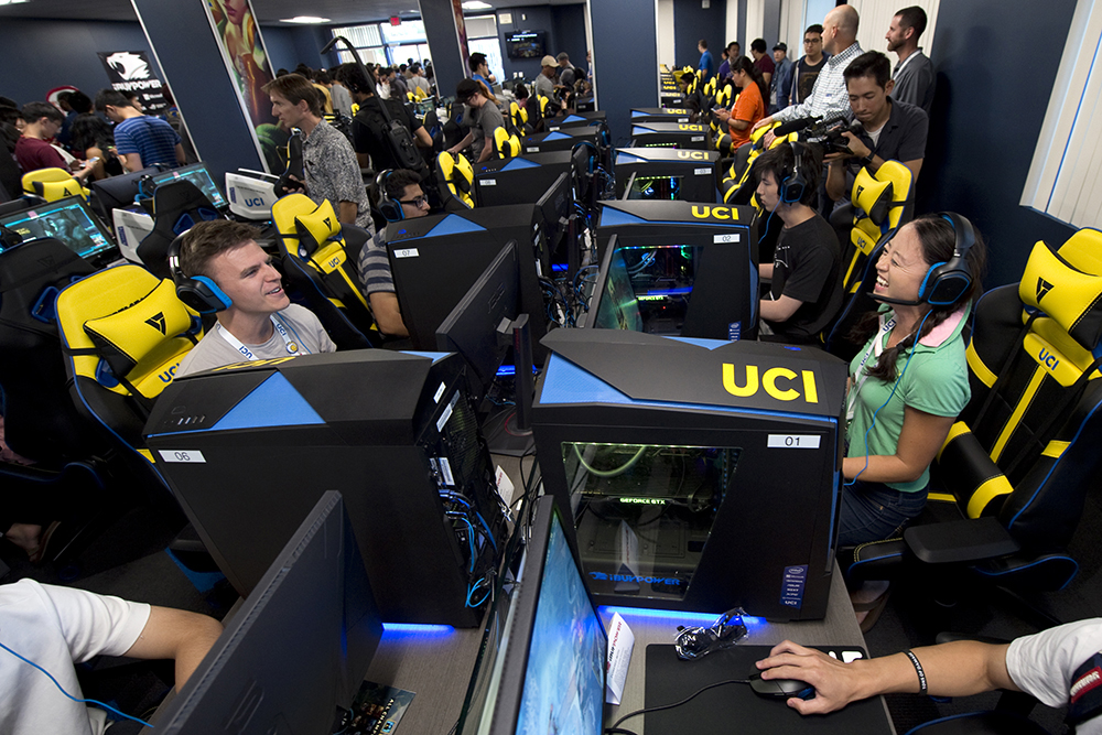 dozens of students sit in front of computers participating in online gaming at UC Irvine