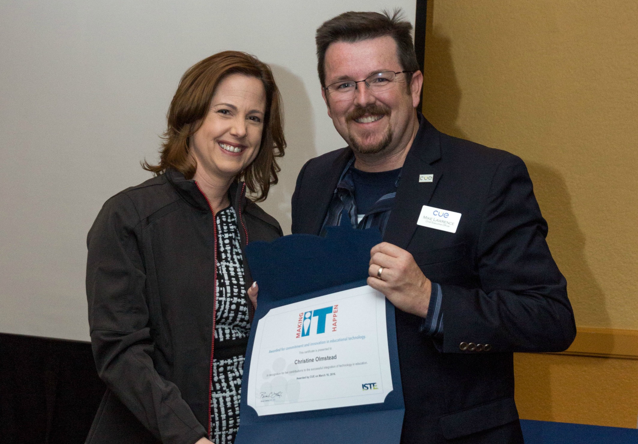 An image of OCDE Assistant Superintendent receiving the Making IT Happen award