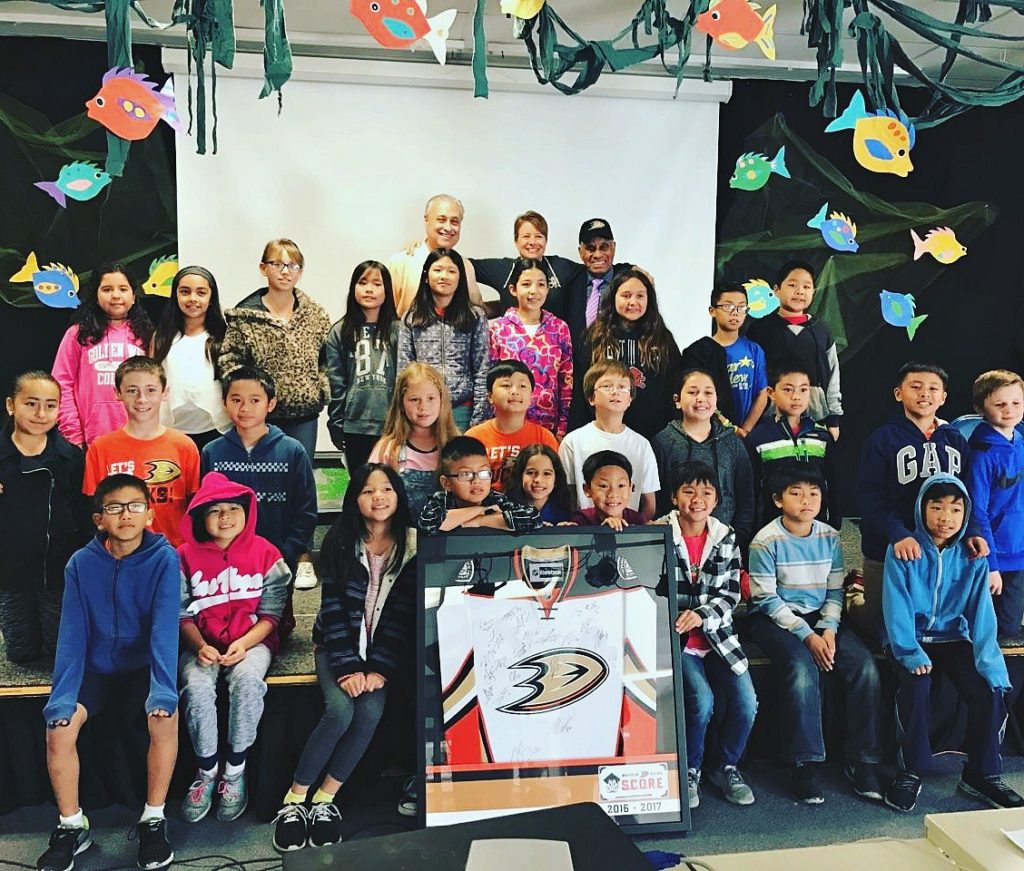 Willie O'Ree with students from Star View Elementary School