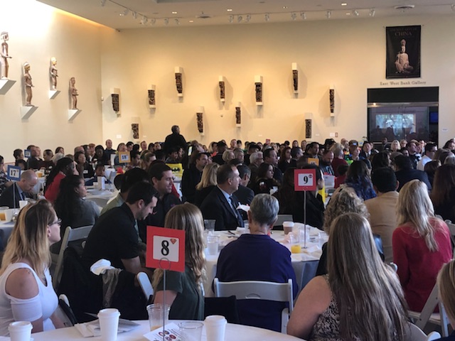 Attendees gather for an awards breakfast at Bowers Museum