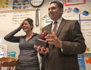 Teacher receives award from county superintendent