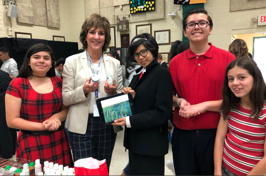 students pose with superintendent Joanne culverhouse