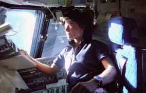 Sally ride in the cockpit of the space shuttle