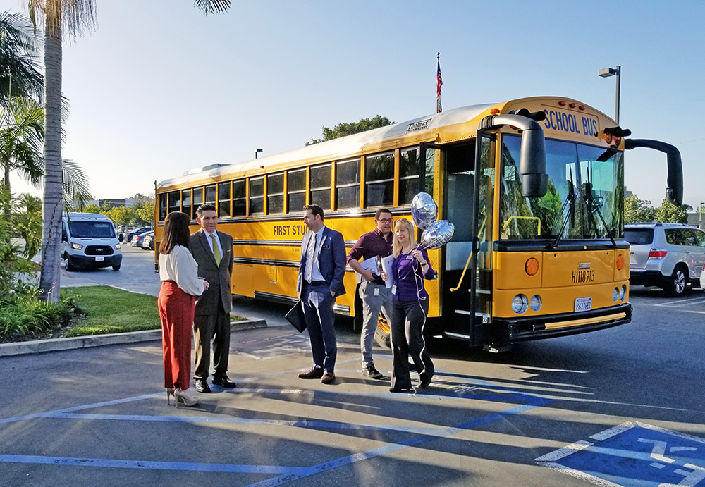 educators prepare to board school bus