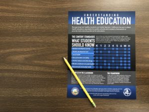 Health education guide on a table
