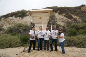 OCDE staff at a beach cleanup event