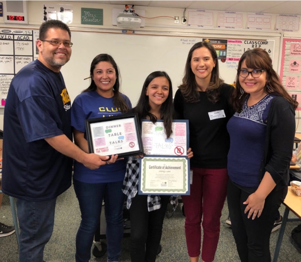 Ashley Lopez with school and club staff members