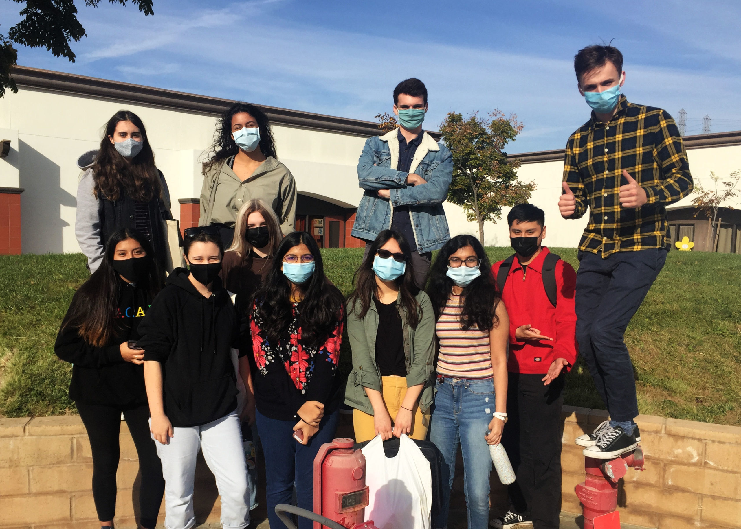 Team of students wearing masks