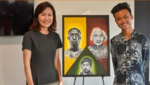 Raymond Tran-Nguyen First Place Painting, “Unity” (L to R: Congresswoman Michelle Steel (CA-48), CMHS Student Raymond Tran-Nguyen)