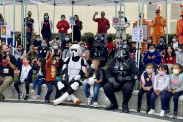 Star Wars characters with students and staff