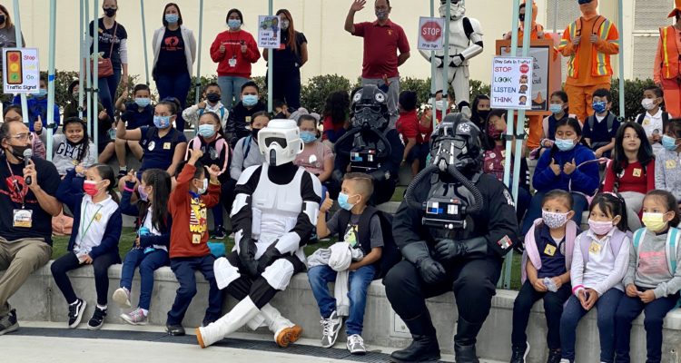 Star Wars characters with students and staff