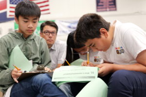 McGarvin Intermediate School students from the Garden Grove Unified School District read and answer questions as a team during the Super Quiz round of the 2025 Orange County Academic Pentathlon, held May 3 at Bolsa Grande High School.