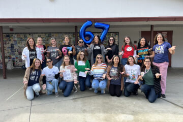 Teachers at Los Alamitos Elementary School sport their custom “six seven” shirts — many of them hand-designed — to celebrate the 67th day of the school year with students.