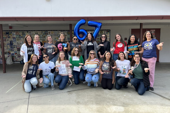 Teachers at Los Alamitos Elementary School sport their custom “six seven” shirts — many of them hand-designed — to celebrate the 67th day of the school year with students.