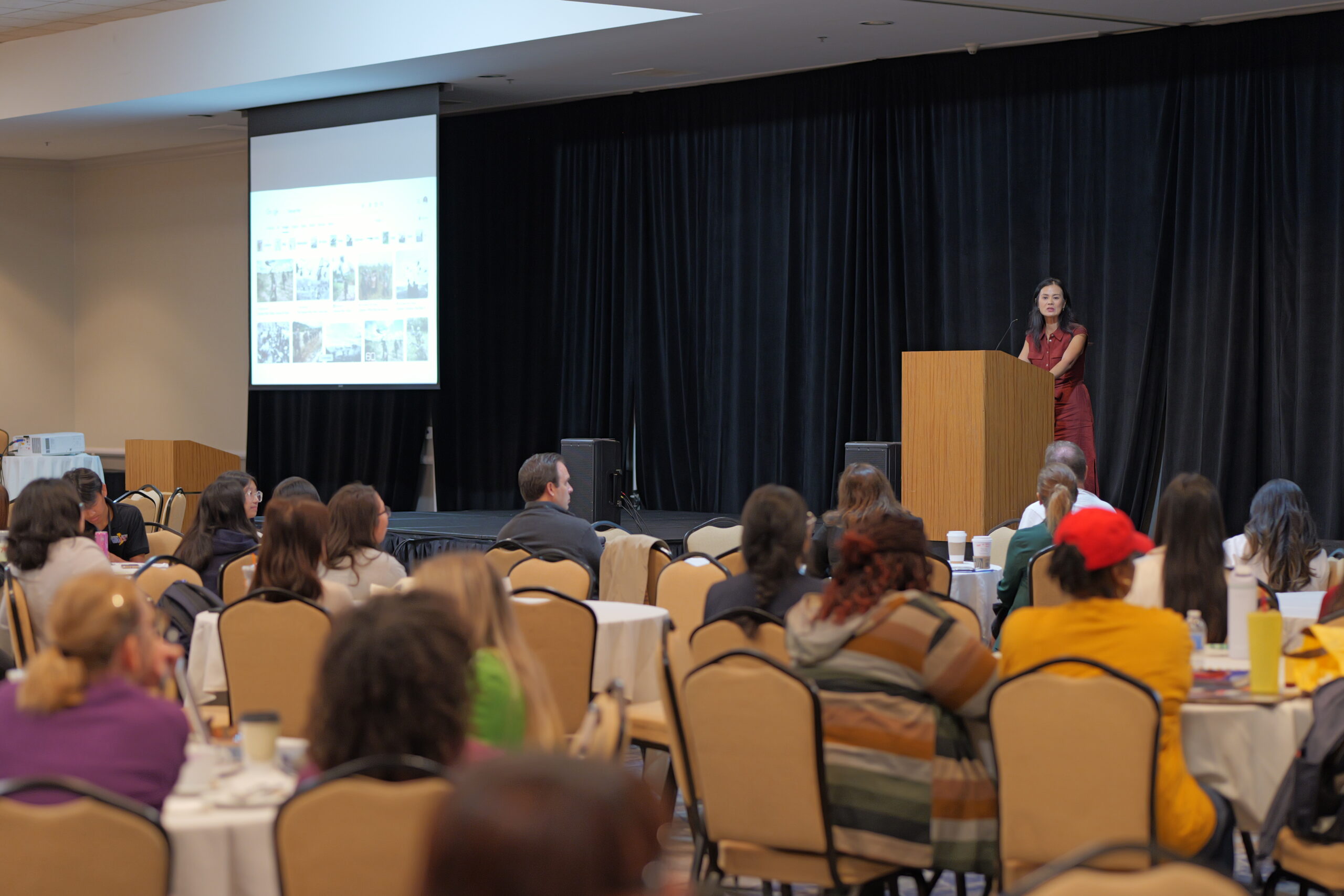 A full room listens as UCLA professor Thúy Võ Đặng delivers the Saturday keynote address.