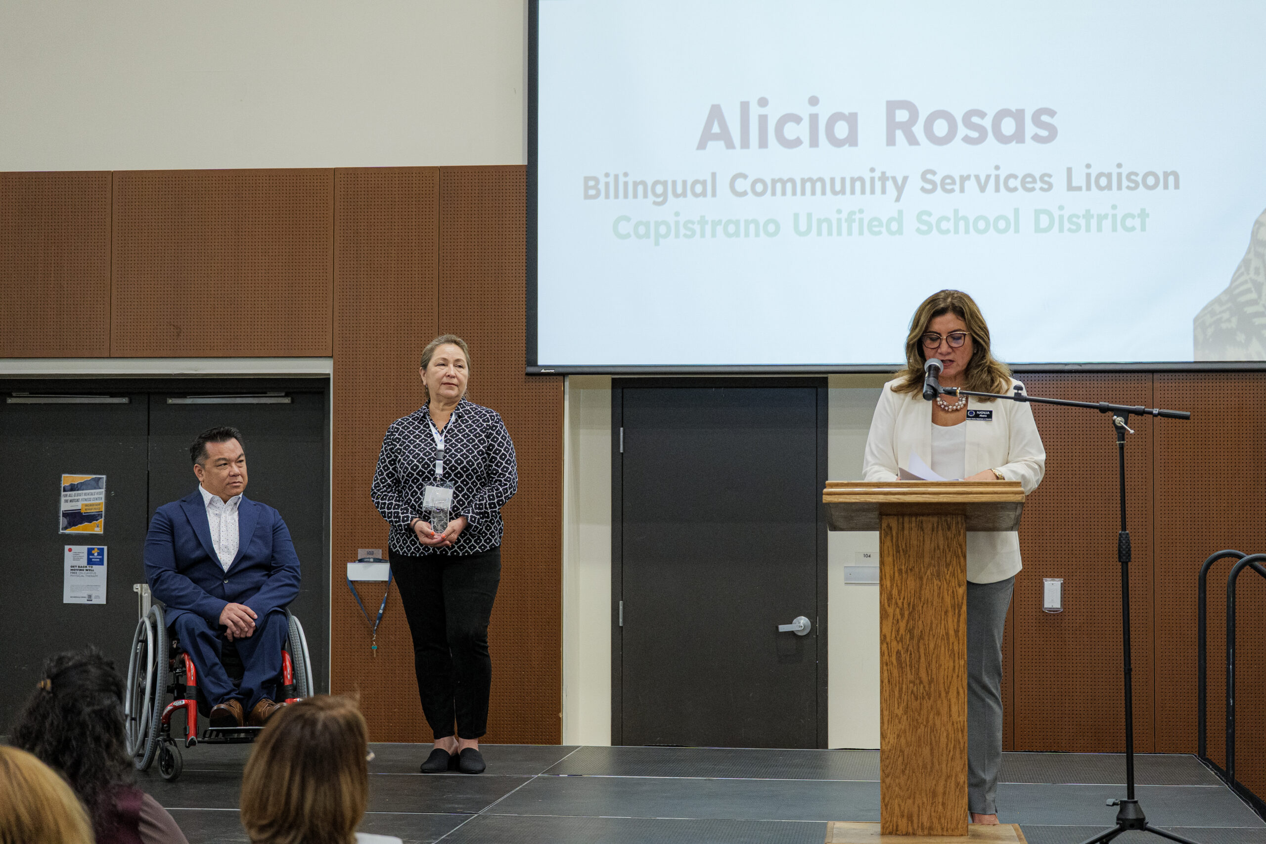Alicia Rosas, a Bilingual Community Services Liaison from the Capistrano Unified School District, stands with Natalia Abarca and Orange County Superintendent of Schools Dr. Stefan Bean after receiving the Multilingual Award of Distinction.