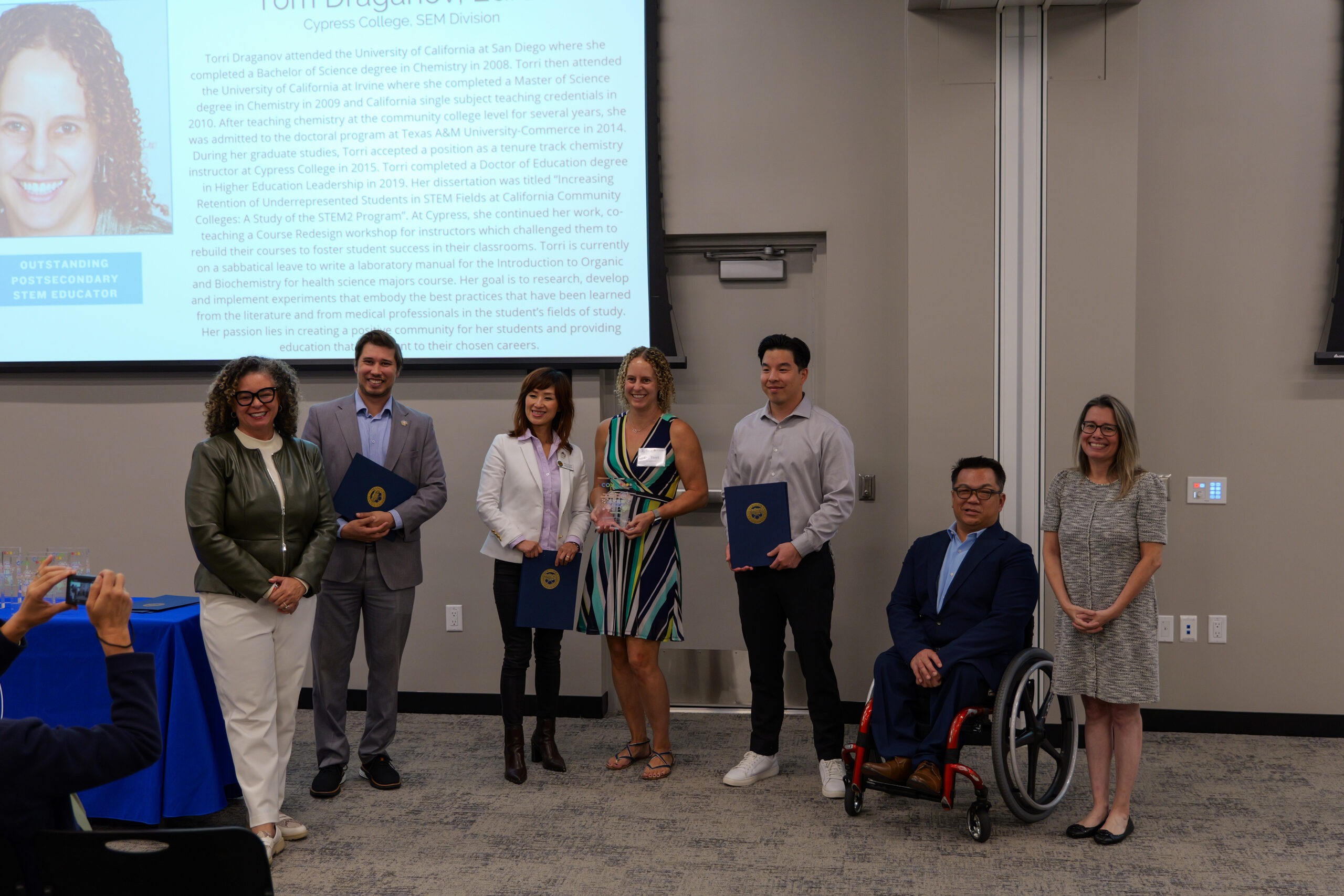 Dr. Torri Draganov receives the award for Outstanding Postsecondary STEM Educator.