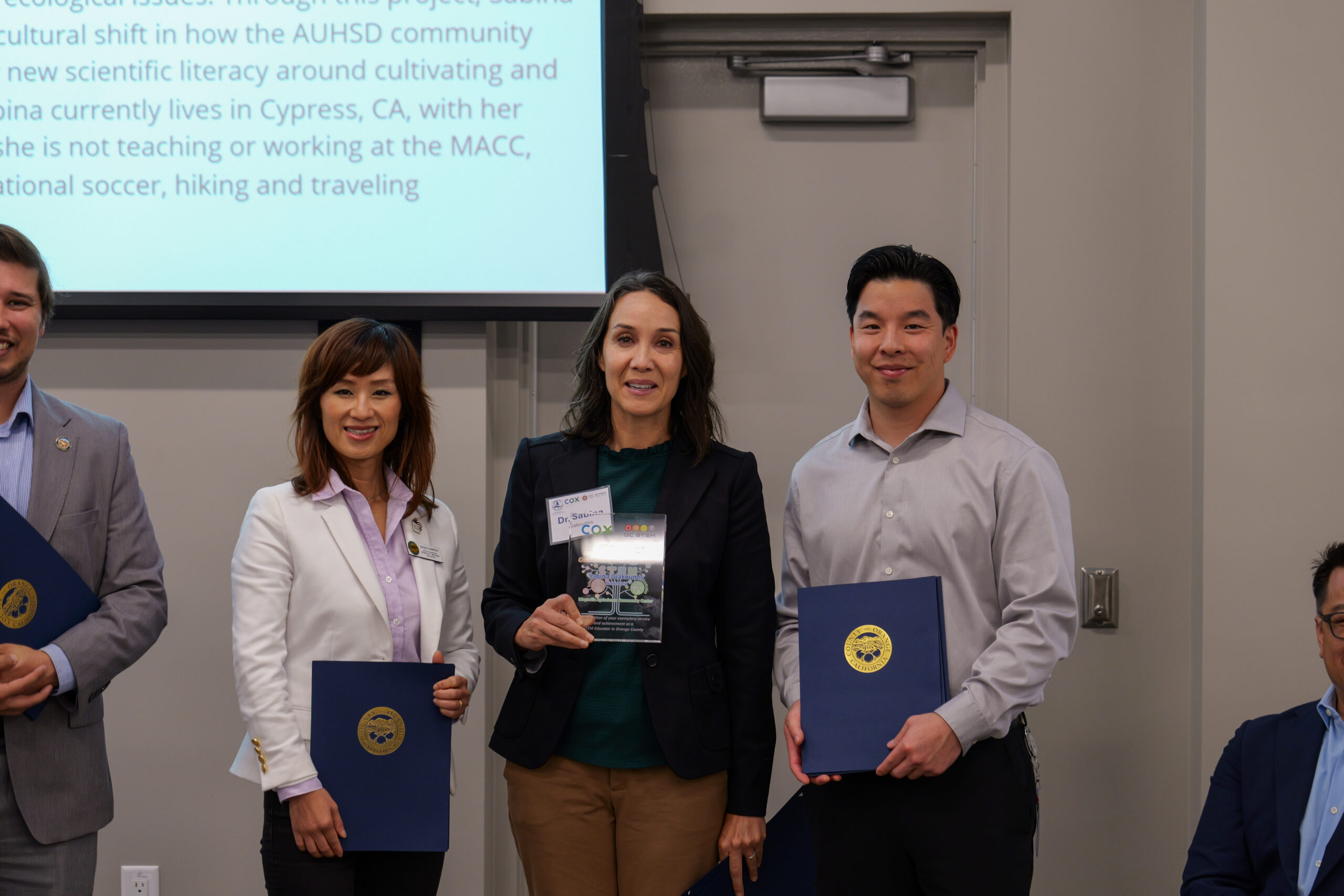 Dr. Sabina Giakoumis accepts the award for Outstanding Leadership in STEM Education.
