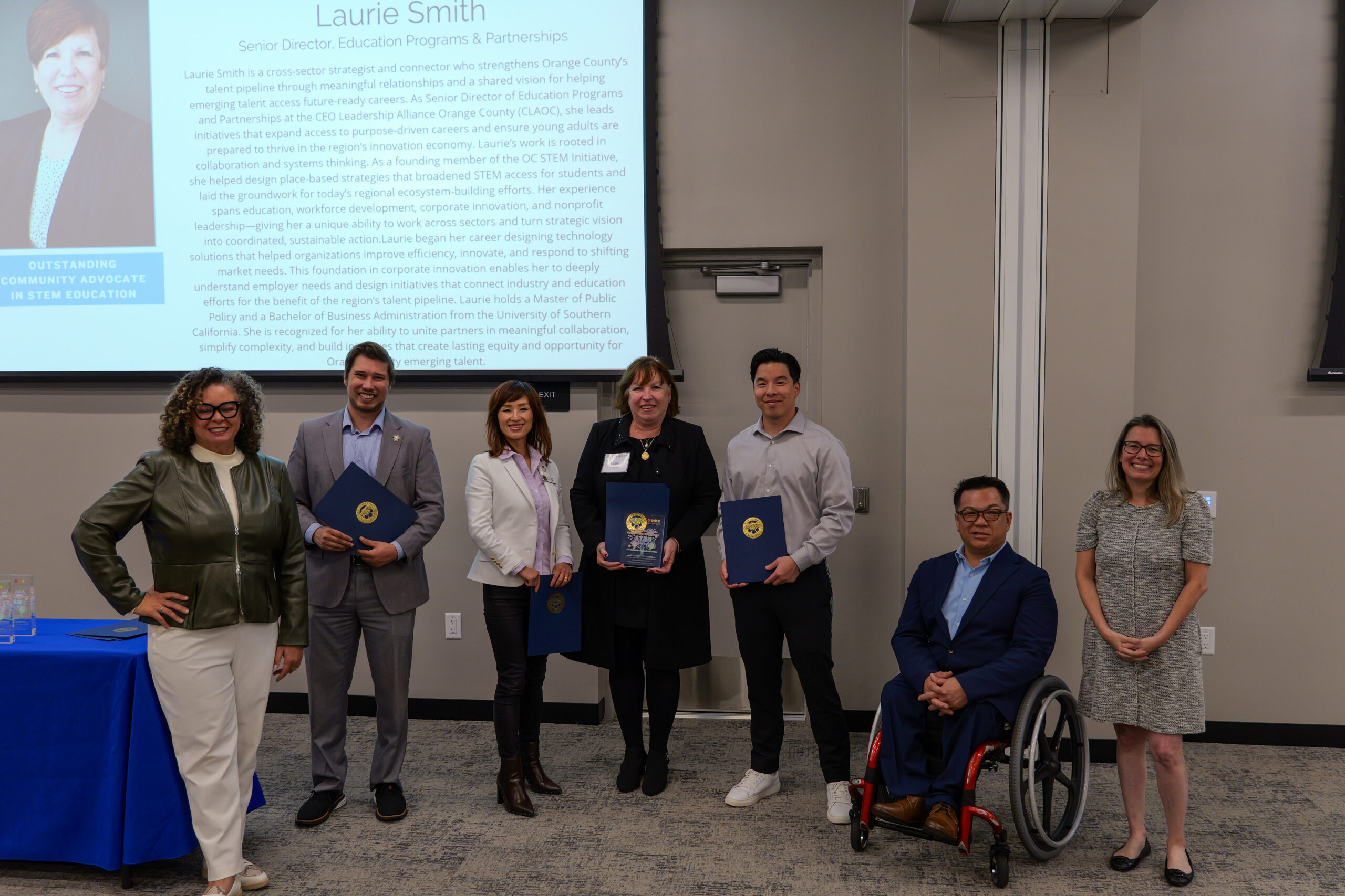 Laurie Smith accepts the award for Outstanding Community Advocate in STEM Education.