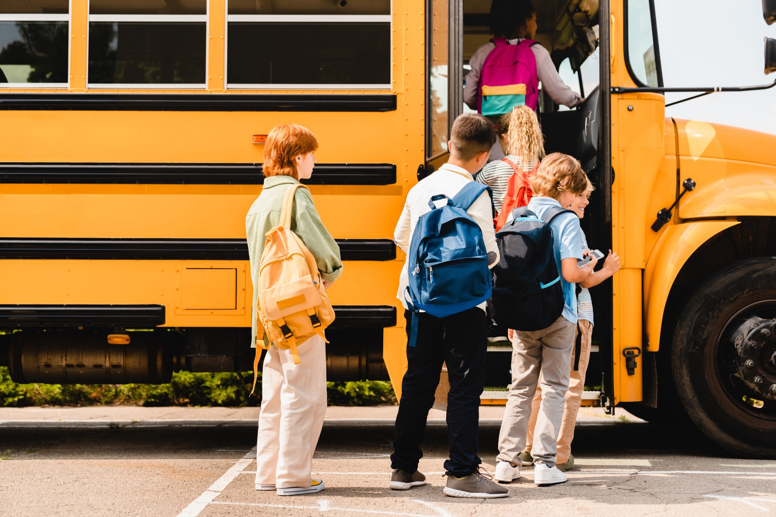 Students in line for a school bus