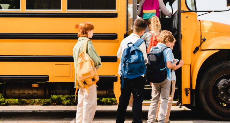 Students in line for a school bus