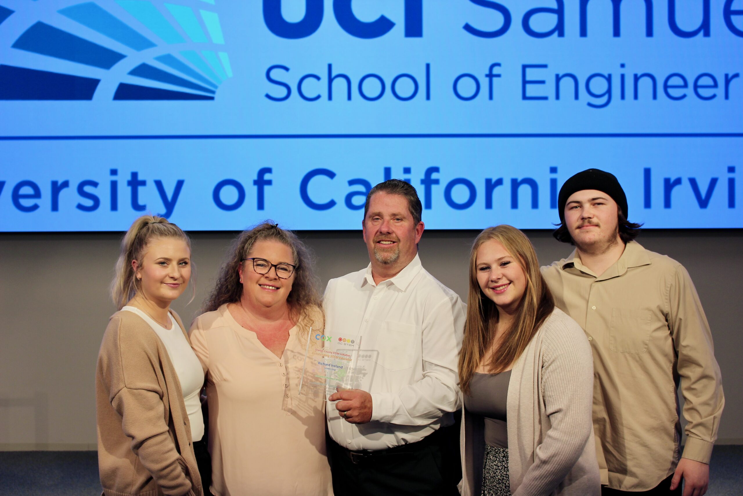 Outstanding STEM educator with family