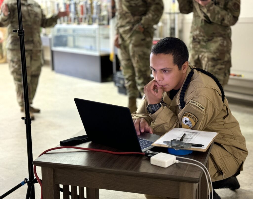 Ortega looking over his photos.