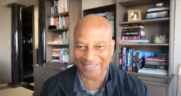 Greyson, a student at OCDE's Harbor Learning Center, with Duey Luu, a staff member from his group home, and OCDE Speech and Language Specialists Art Marmelejo and Paul DePerry.