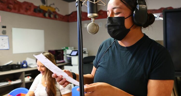 Sunburst Academy Class 30 cadet Abigail Ramirez practice rap lyrics with musician Jamie Ross.