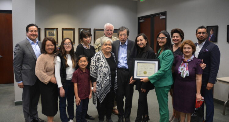 Rancho Santiago Community College District trustee Lawrence Labrado with his family and district colleagues.