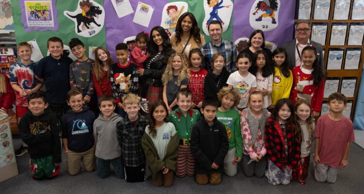 Vanessa and Natalia Bryant with Kaiser Elementary School students and staff and Orange County Department of Education staff