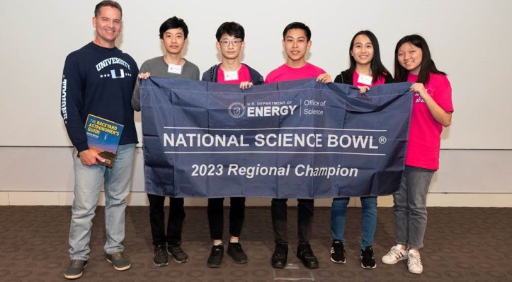 University High School students hold up their 2023 Regional Champions banner for the US Dept. of Energy's Regional Science Bowl. (Courtesy of Irvine Unified School District)