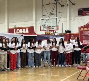 Loara High School softball players at ceremony for school alum Lauren Lappin.