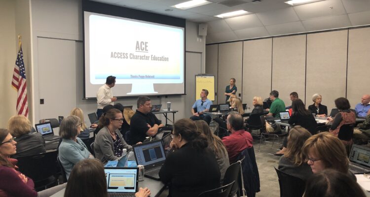 The ACCESS 2 Character Education team presents their free curriculum resource at a conference.