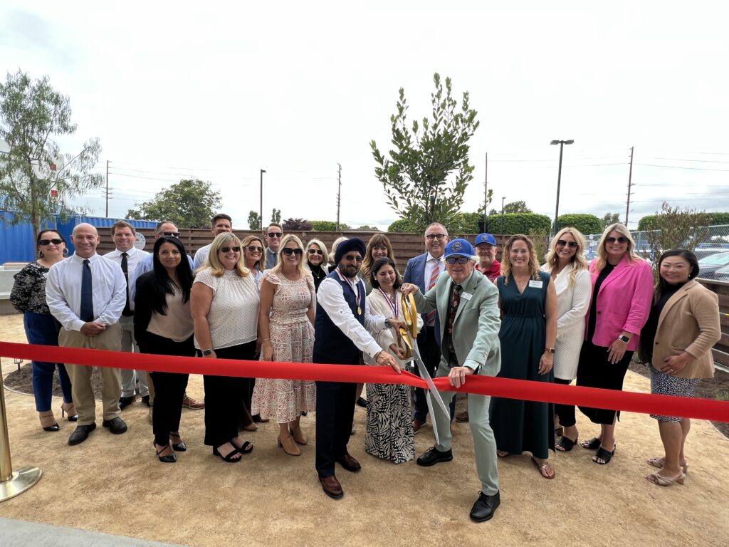 Los Alamitos Unified School District board trustees, administrators and community members "cut the ribbon" to open its new WellSpace garden on Sept. 6. (Courtesy of Los Alamitos Unified)